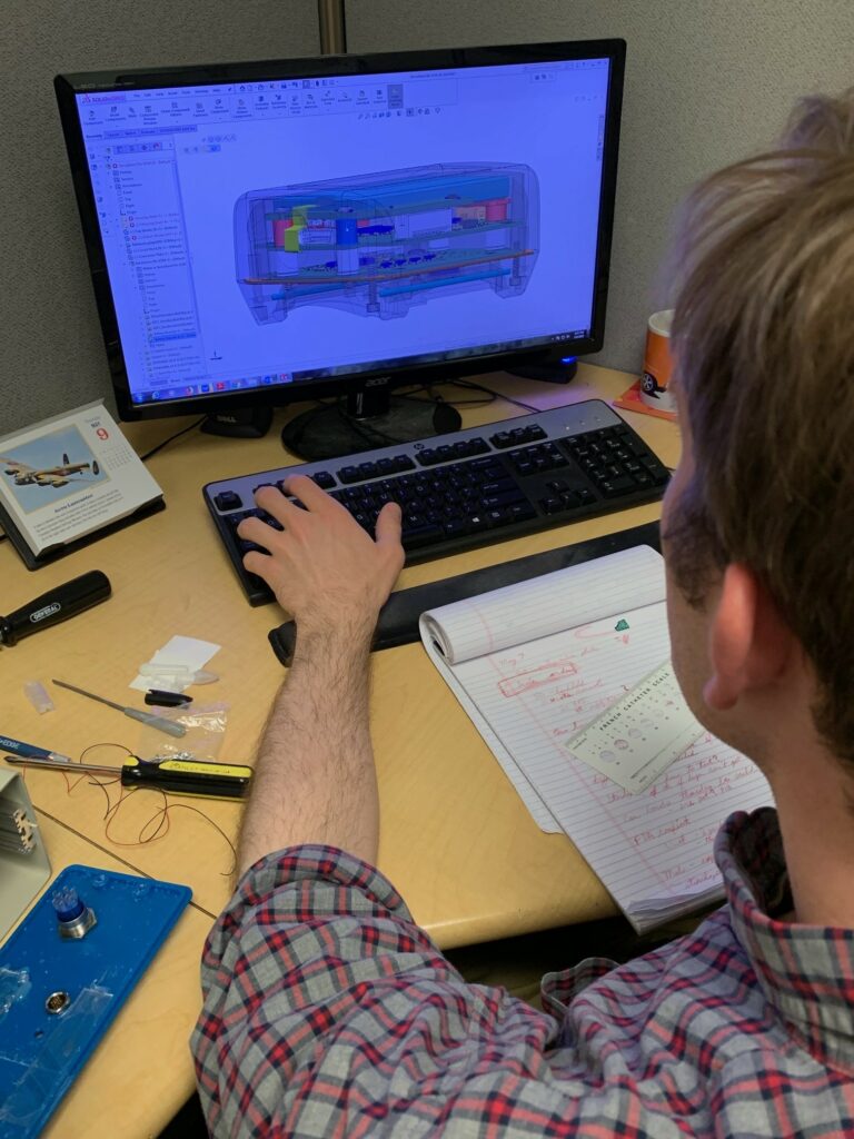 Man reviewing diagram on computer